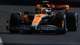 2025 F1 Champion Lando Norris Driving the MCL60 at Goodwood