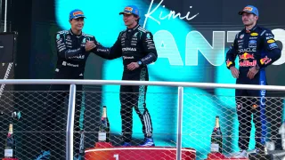 George Russell reacts to being booed on Monza F1 podium after Italian GP